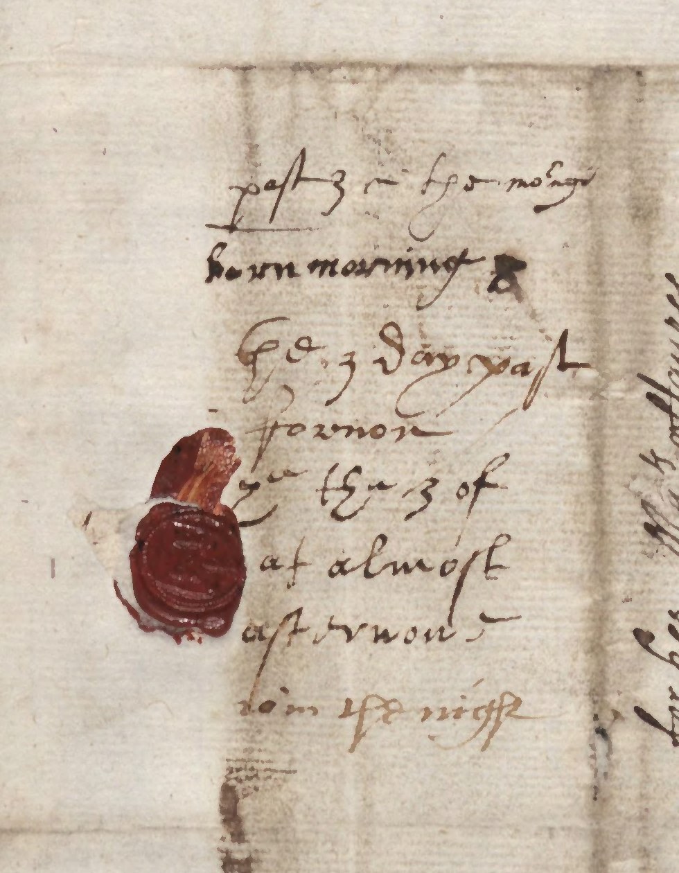 Postal endorsements beside the seal, enlarged and turned upright; the London time is at the bottom. Separate view of the same leaf. Image © Hatfield House Archives, 2010 / ProQuest, The Cecil Papers.
